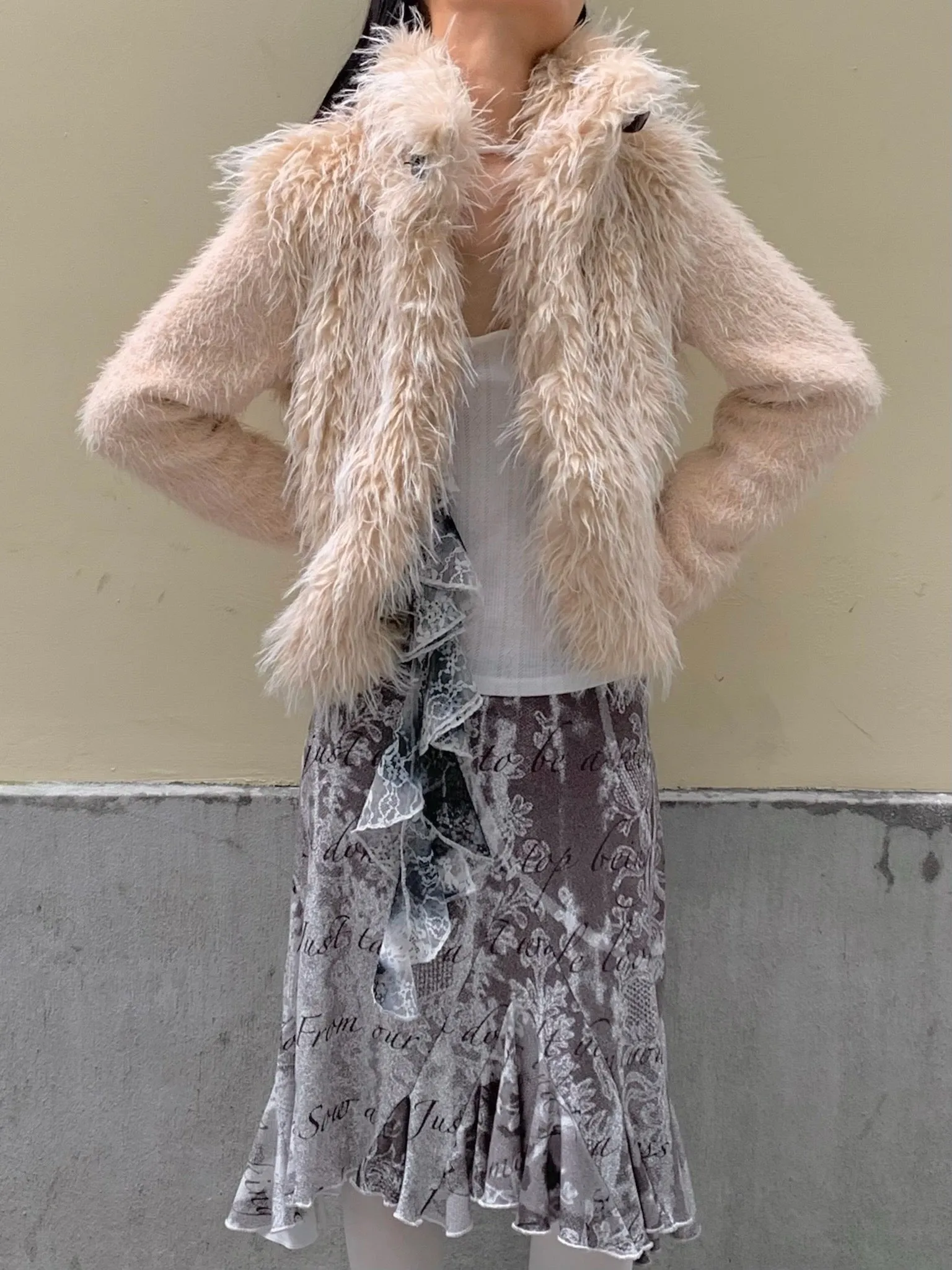 Beige warm faux fur coat with thick knit sleeves