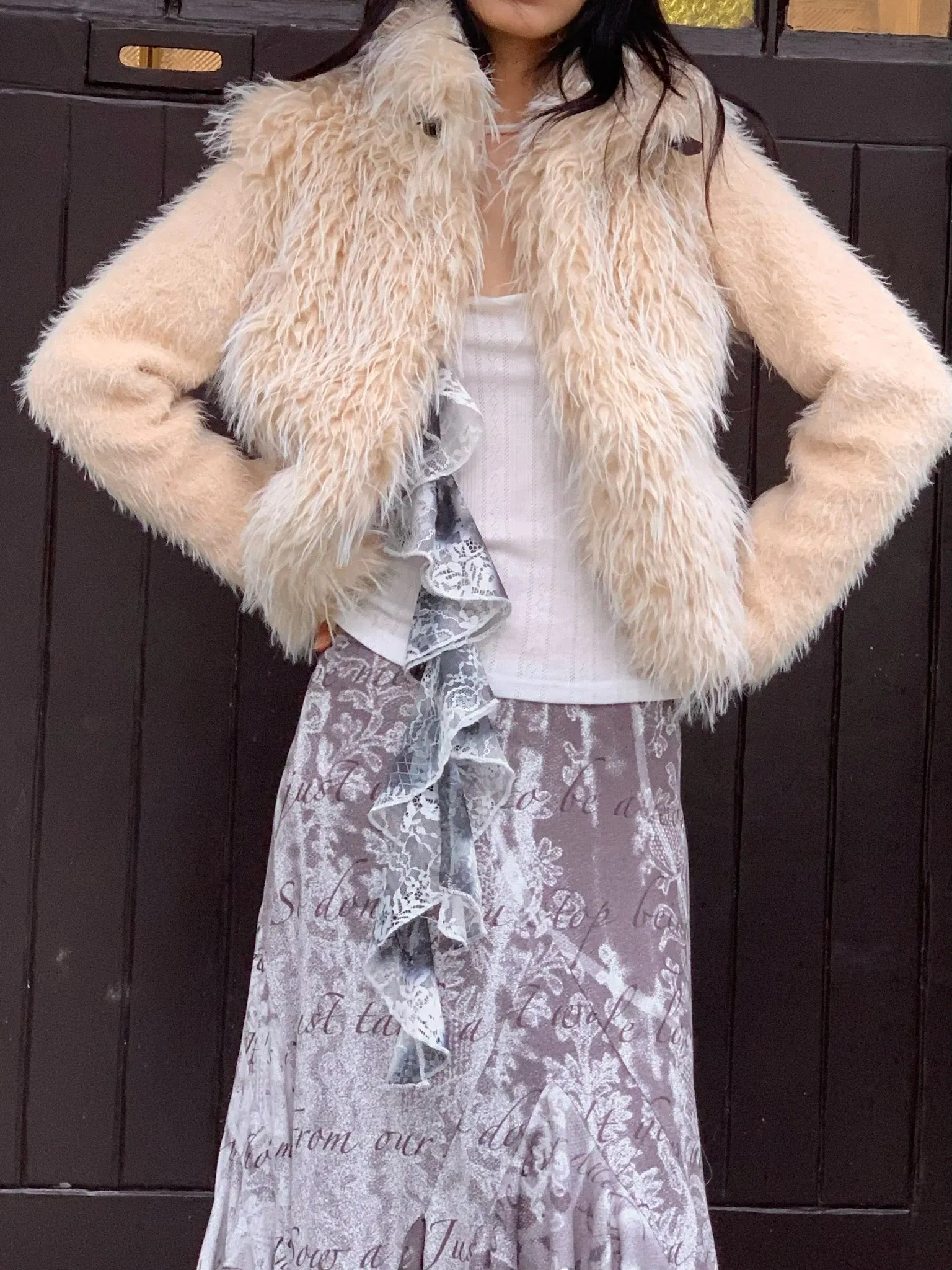 Beige warm faux fur coat with thick knit sleeves